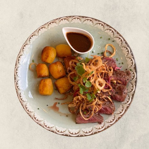 Hungarian-style beef steak with onions 